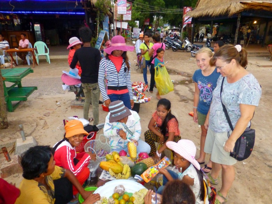 Cambodia,Sihanokville Beach buying fresh fruit