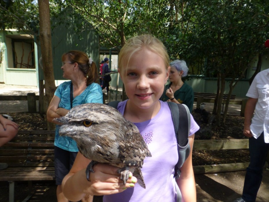 Lydia iss holding a friendly owl